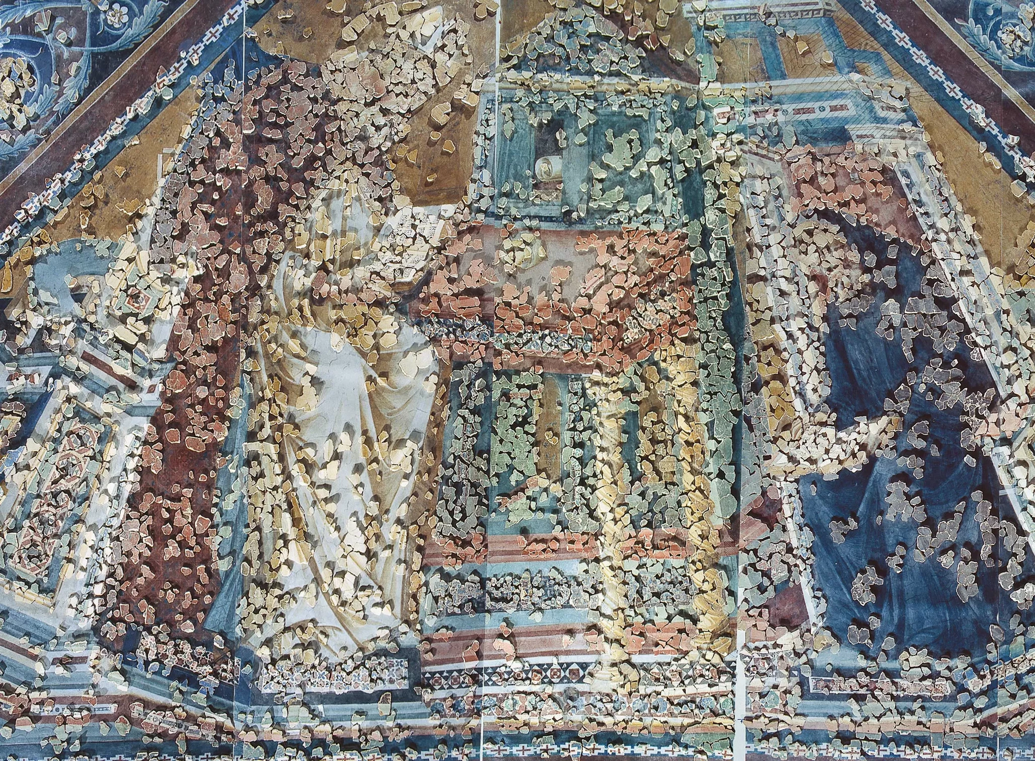 Fresco fragments arranged to reconstruct a figure and its decorated frame.