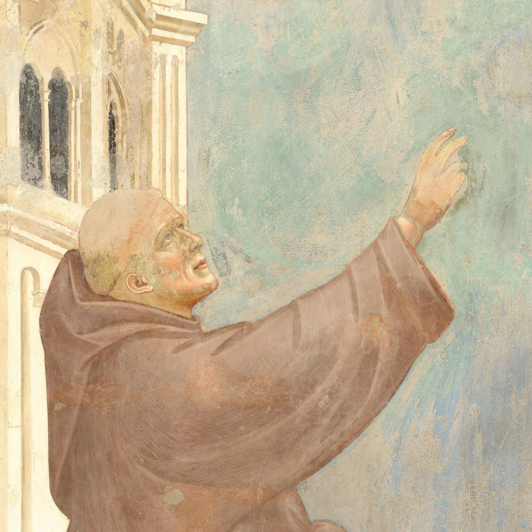 Friar Sylvester raises his arm and hand towards the city of Arezzo.