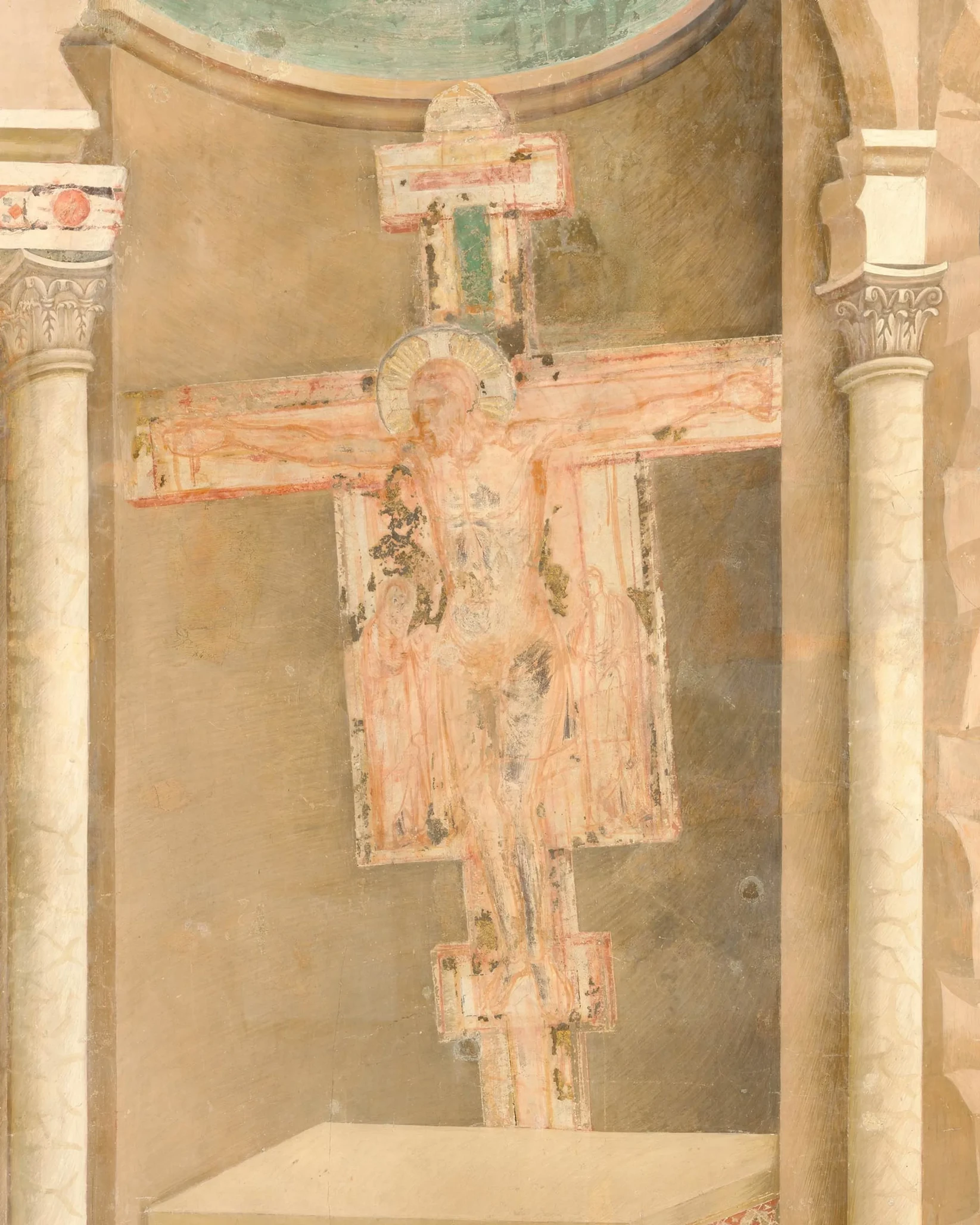 Painted crucifix suspended inside the church of San Damiano.