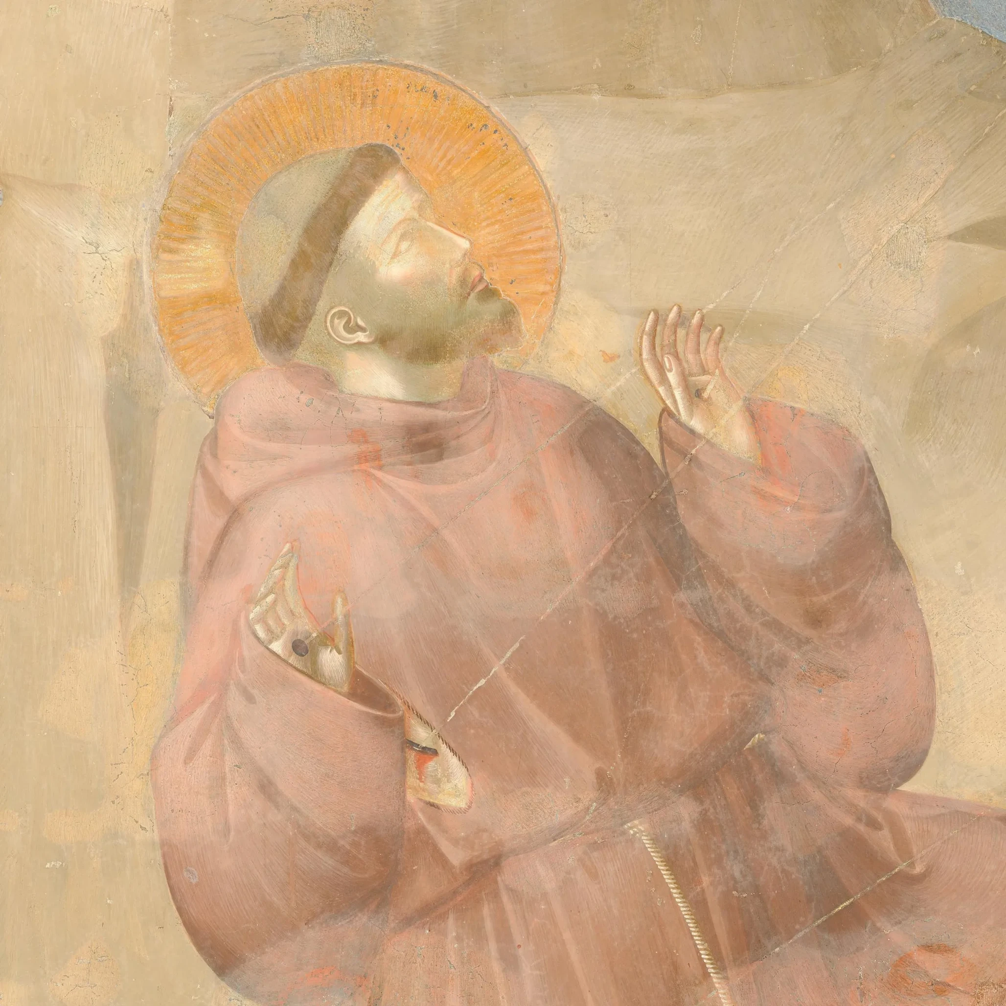 Francis looks upwards with open hands reached by the rays of the stigmata.