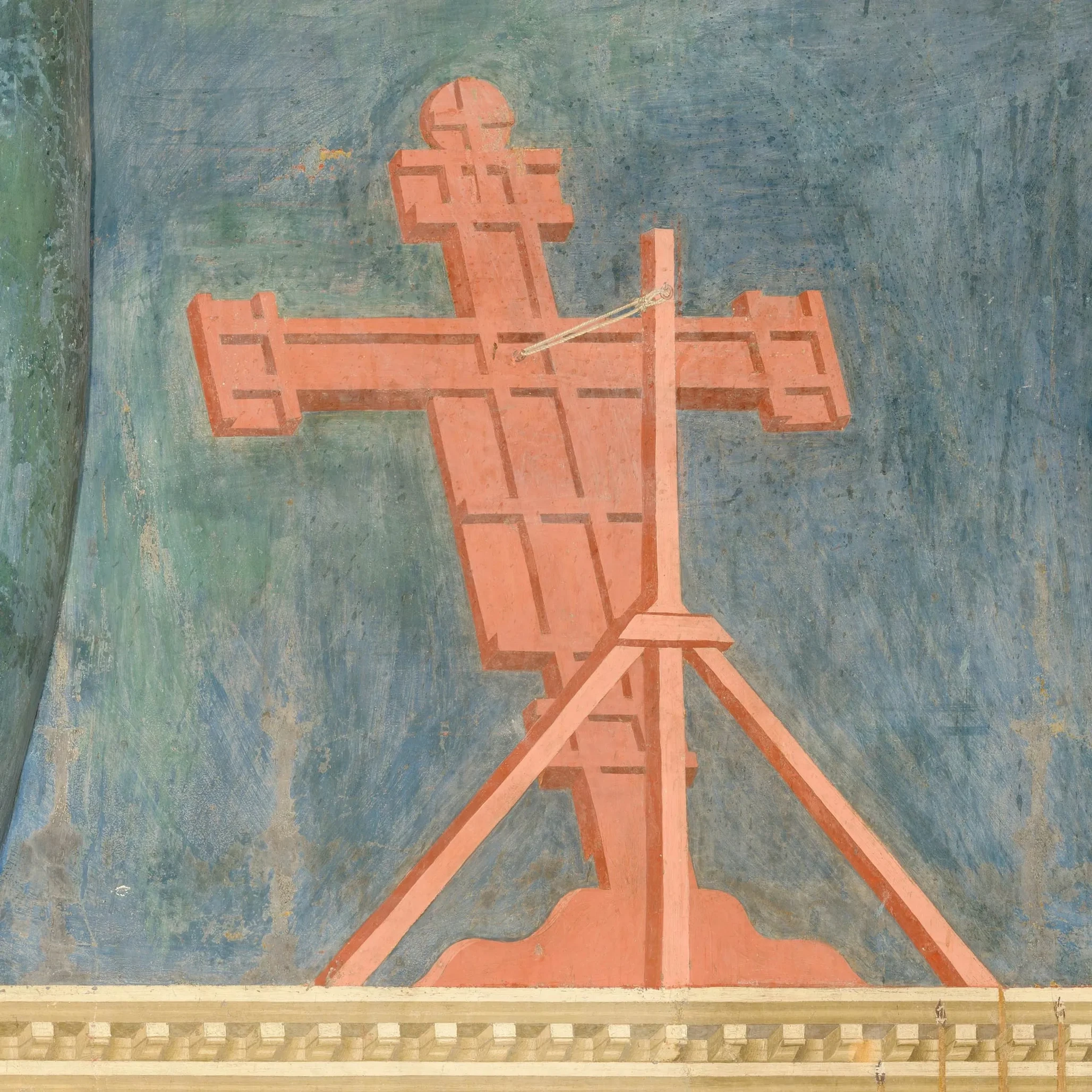 The back of the crucifix in the Nativity at Greccio, with its wooden structure and supports visible.