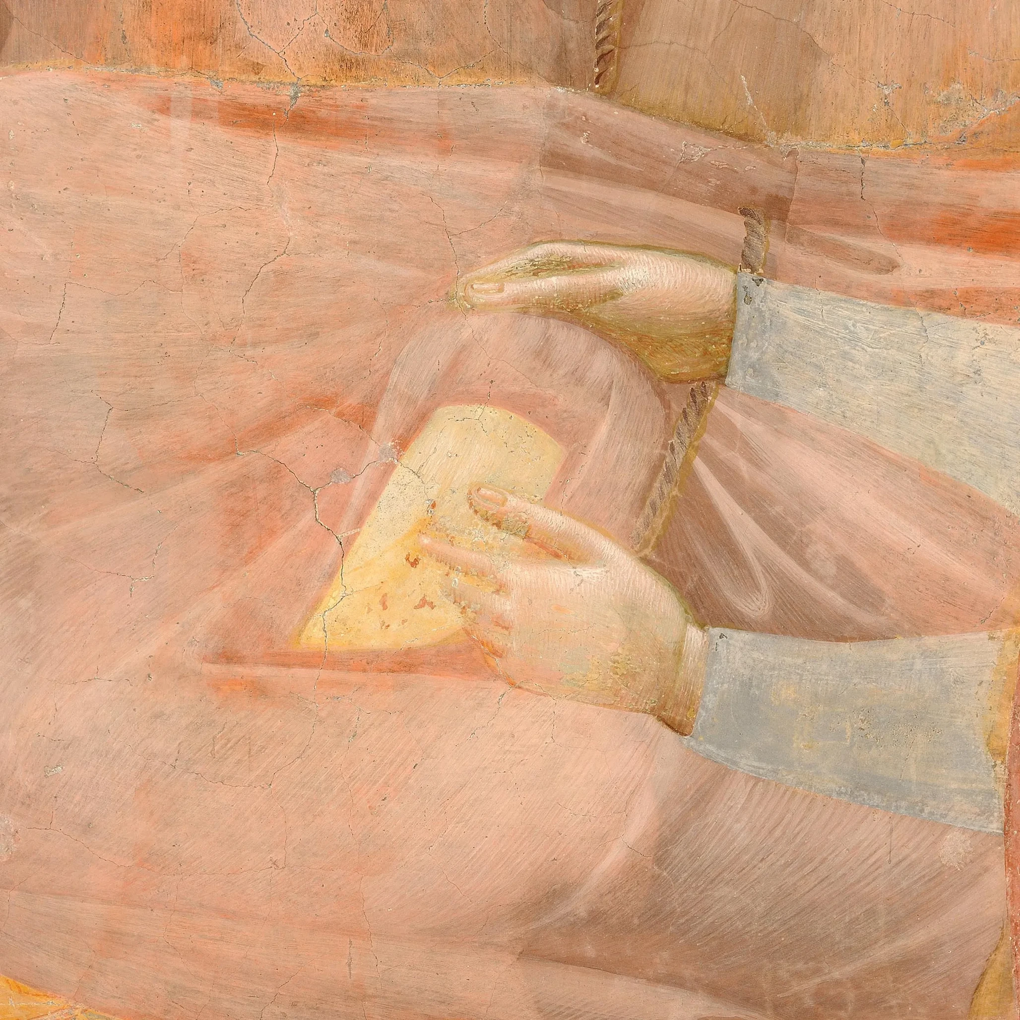 Two hands pull back Francis’s robe and touch his side in the Verification of the Stigmata.