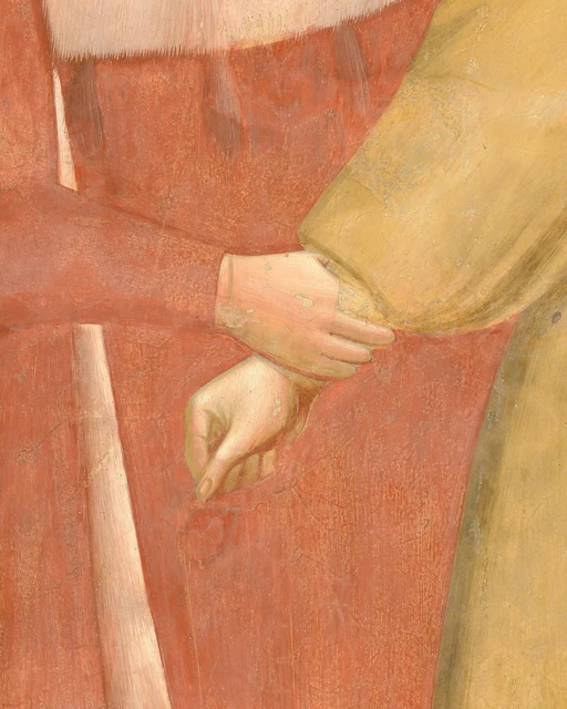 Detail of one hand gripping another person’s wrist in the Renunciation of Worldly Goods.